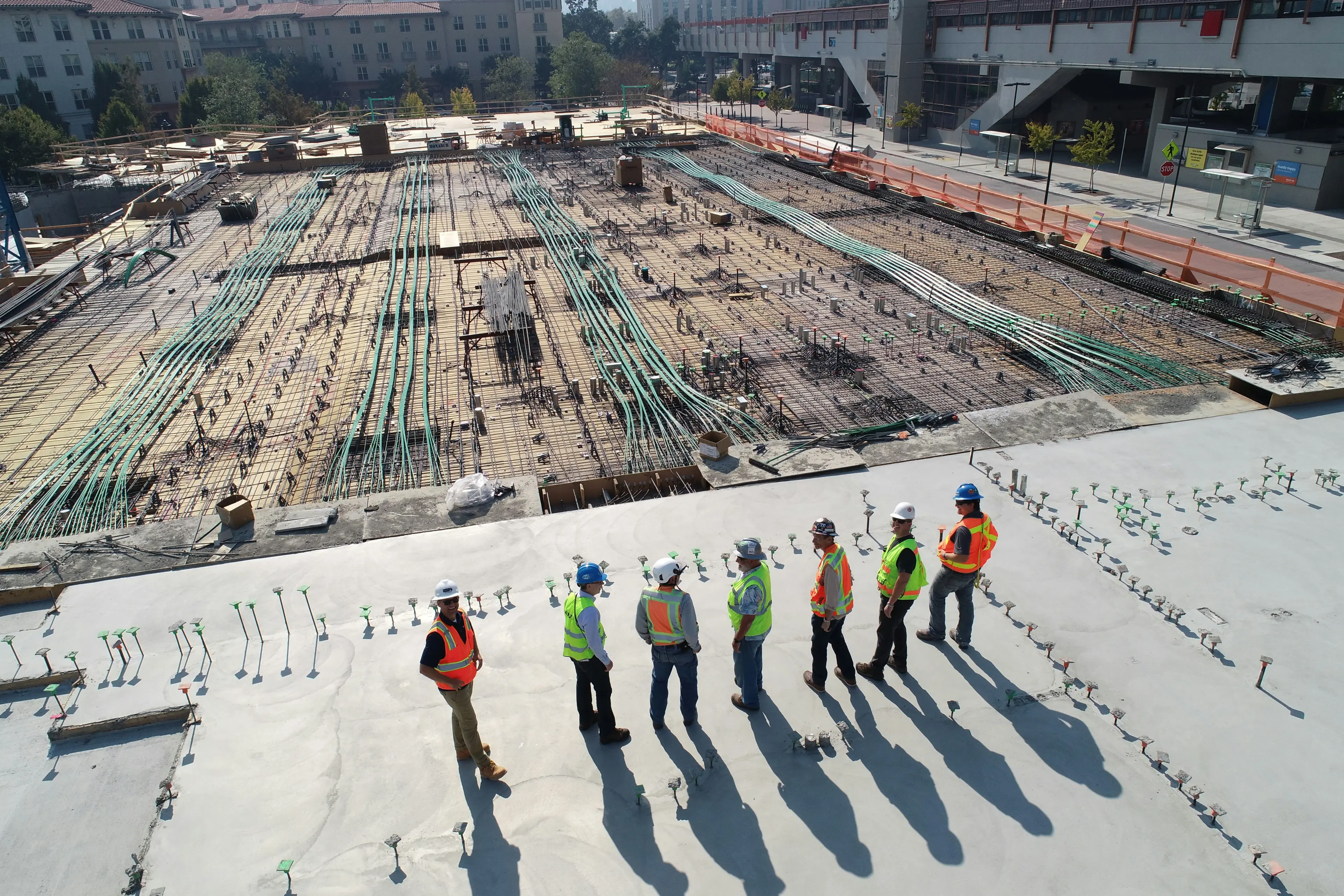 Construction crew in PPE on a concrete pour